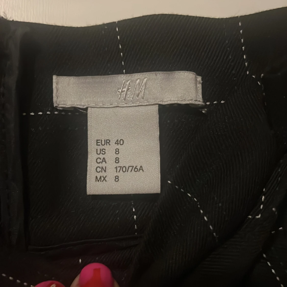 Svart rutig kjol med knyt från H&M - 1