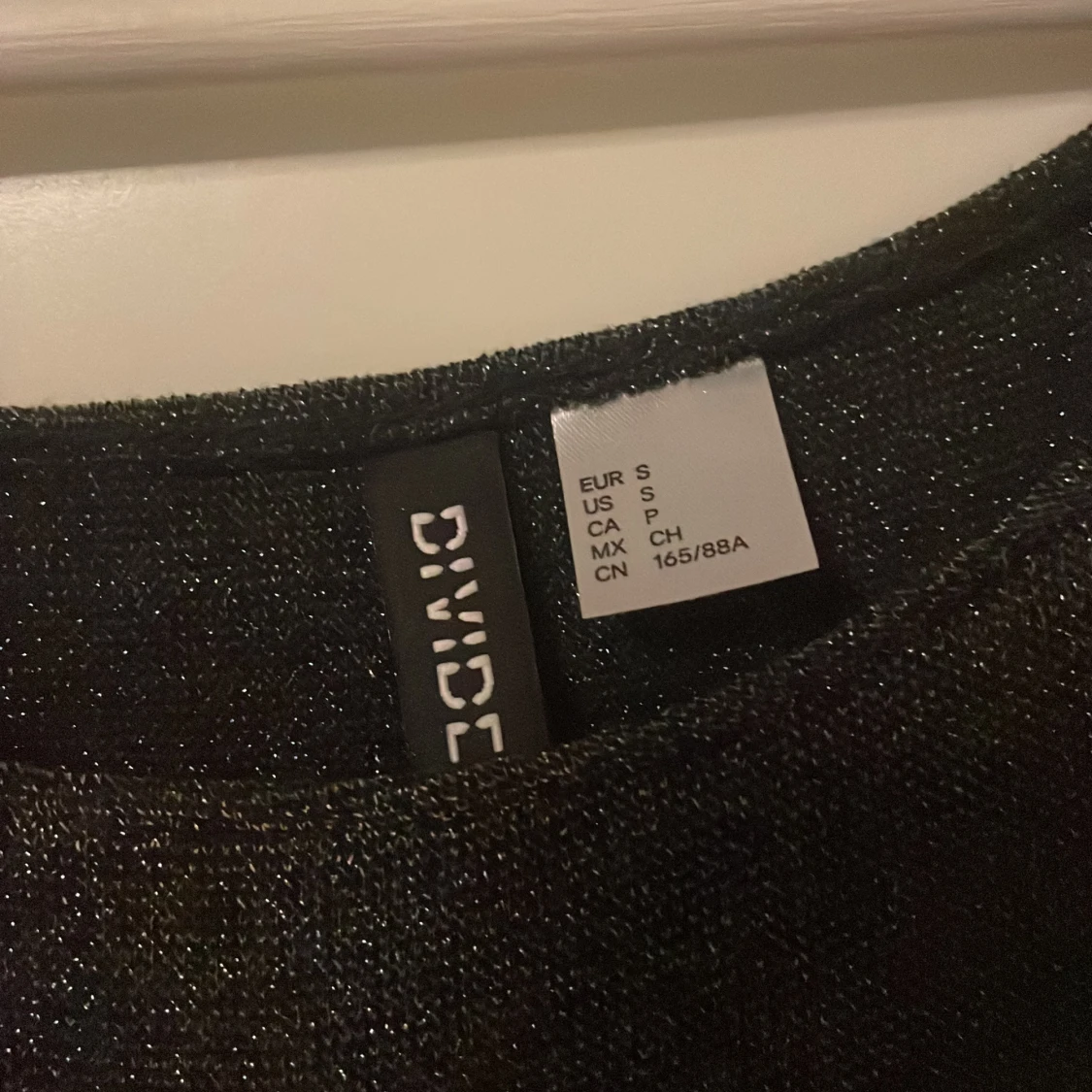 Svart glittrig body - 1