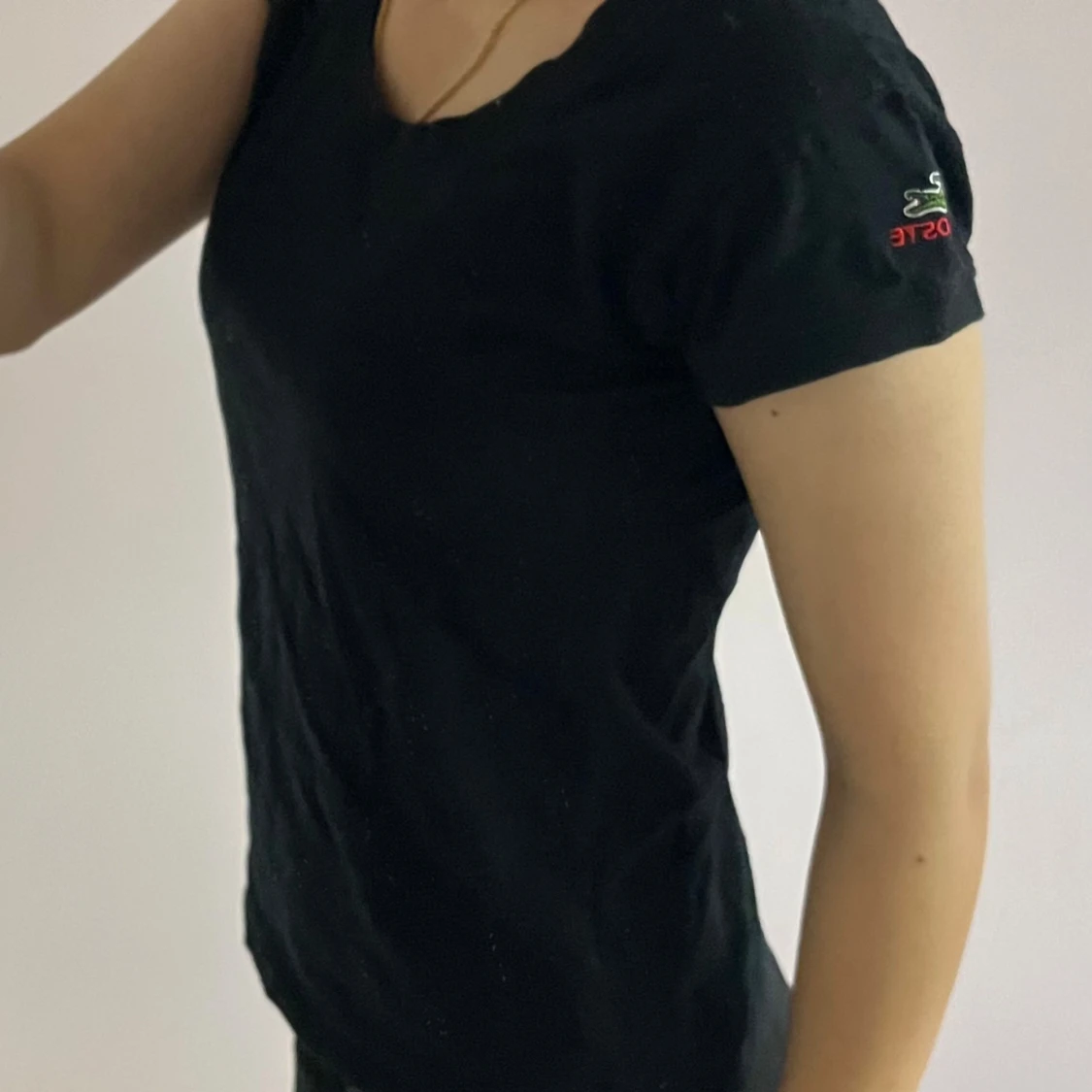 Svart kortärmad topp från Lacoste - 1