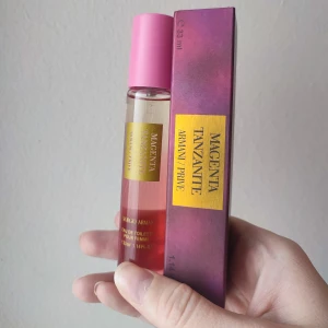 Giorgio Armani Magenta Tanzanite Perfume - Giorgio Armani Magenta Tanzanite Perfume. 33ml bottle. New! A great winter/fall fragrance.