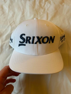 Srixon vit golfkeps - Vit golfkeps helt ny 
