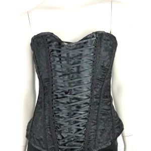 Korsett ( ej underklädeskorsett ) storlek XL - Helt ny korsett ( ej underklädeskorsett ). Storlek XL.