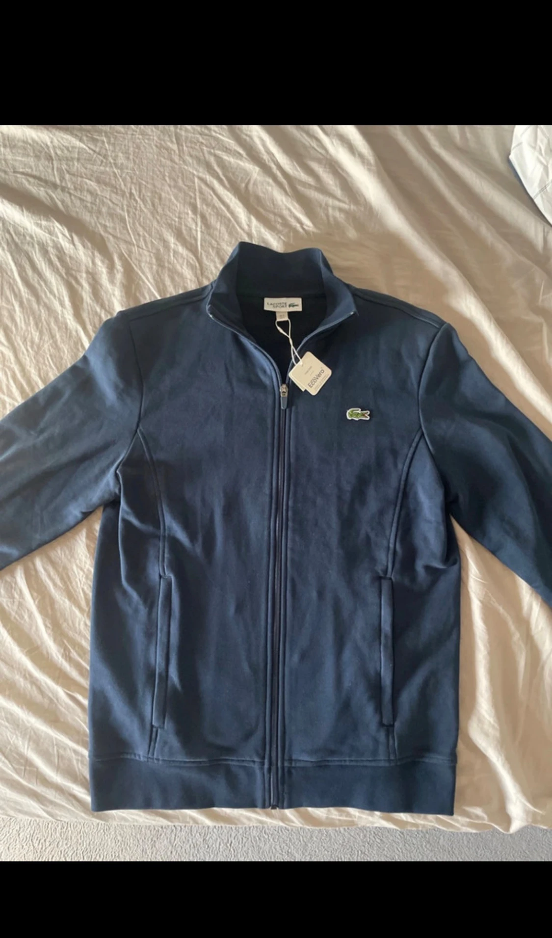 Marinblå zipjacka från Lacoste Sport