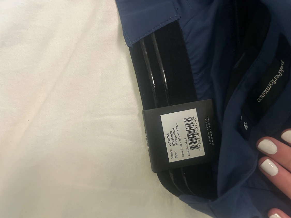 Mörkblå kostymbyxor från Peak Performance - 1