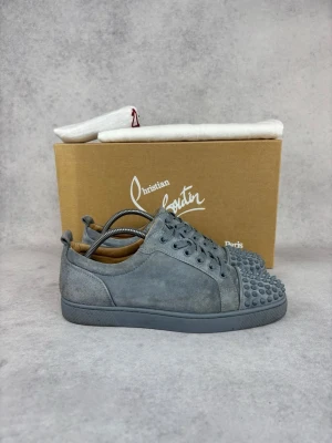 Christian Louboutin junior spike sneaker - Size: 41,5  – Condition: 8/10  – What is included: Dustbag   Retail price: 9000 + SEK