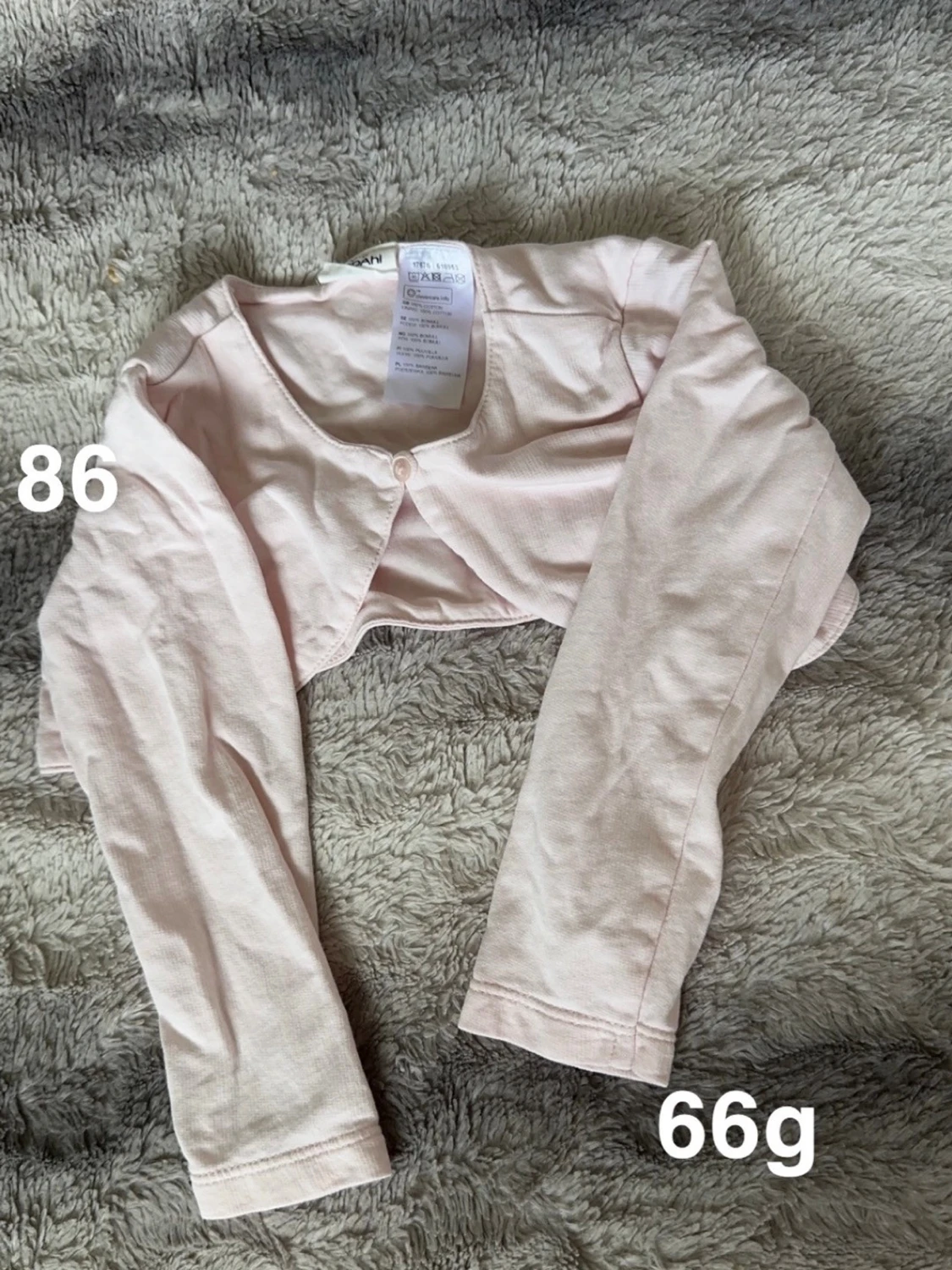 Ljusrosa bolero-kofta från Kappahl 