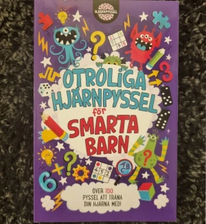 Otroliga hjärnpyssel av Gareth Moore - Boken innehåller över 100 roliga pyssel för 9-12 år. Här hittar du pyssel som sudoku, hitta skillnaden, nummerlabyrinter, frågesporter och dominospel.  Antal sidor : 192  Jag erbjuder julklappinslagning. Bara meddela mig så ordna jag ett fint paket!