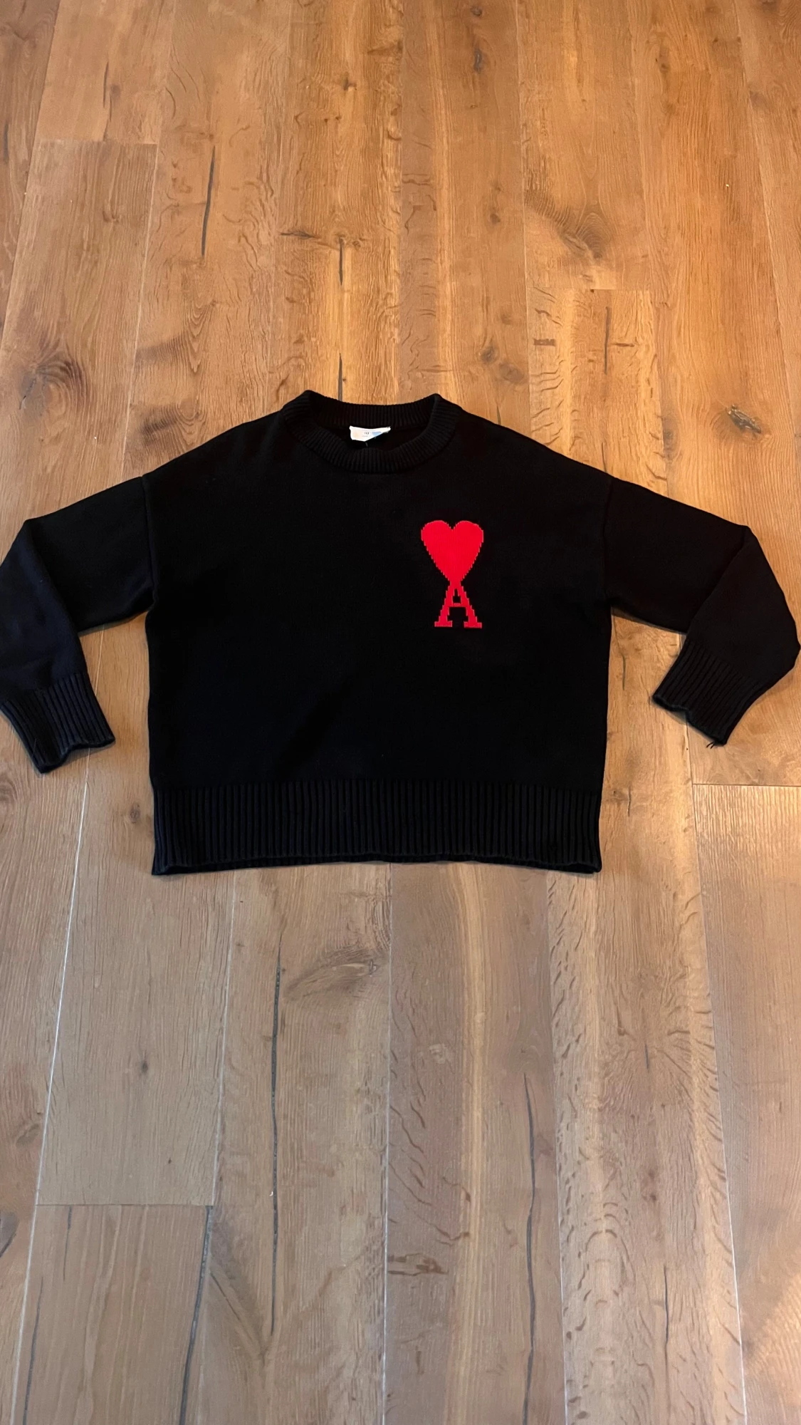 Svart stickad tröja från Ami Paris storlek M