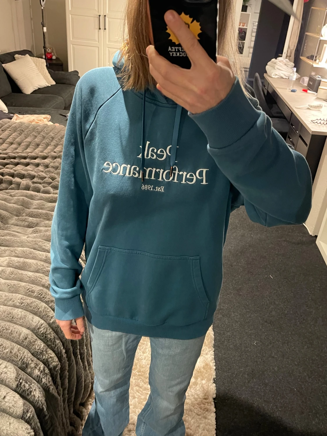 Blå hoodie från Peak Performance