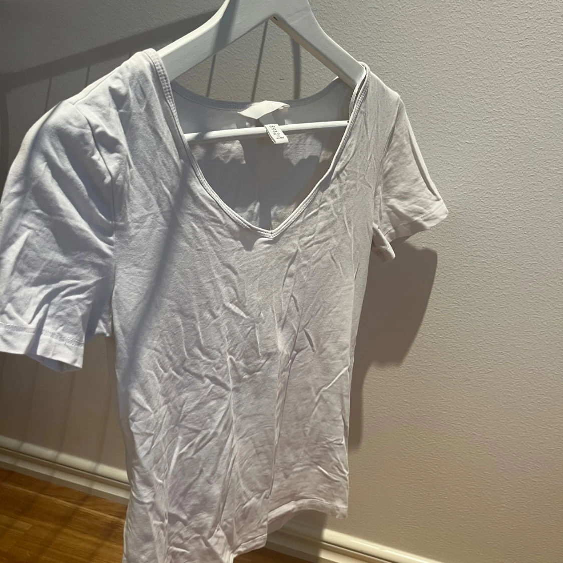 Vit v-ringad topp från H&M - 2