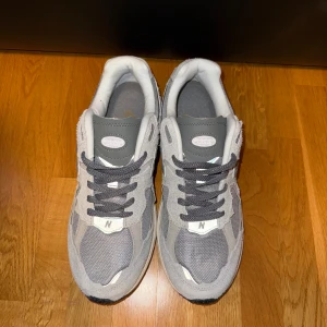 New Balance Protection Pack! - Säljer dessa sjukt feta new balance skor som jag fick i present. Storleken var fel och kan då inte använda dom. De är helt nya, inte använda en gång utomhus.