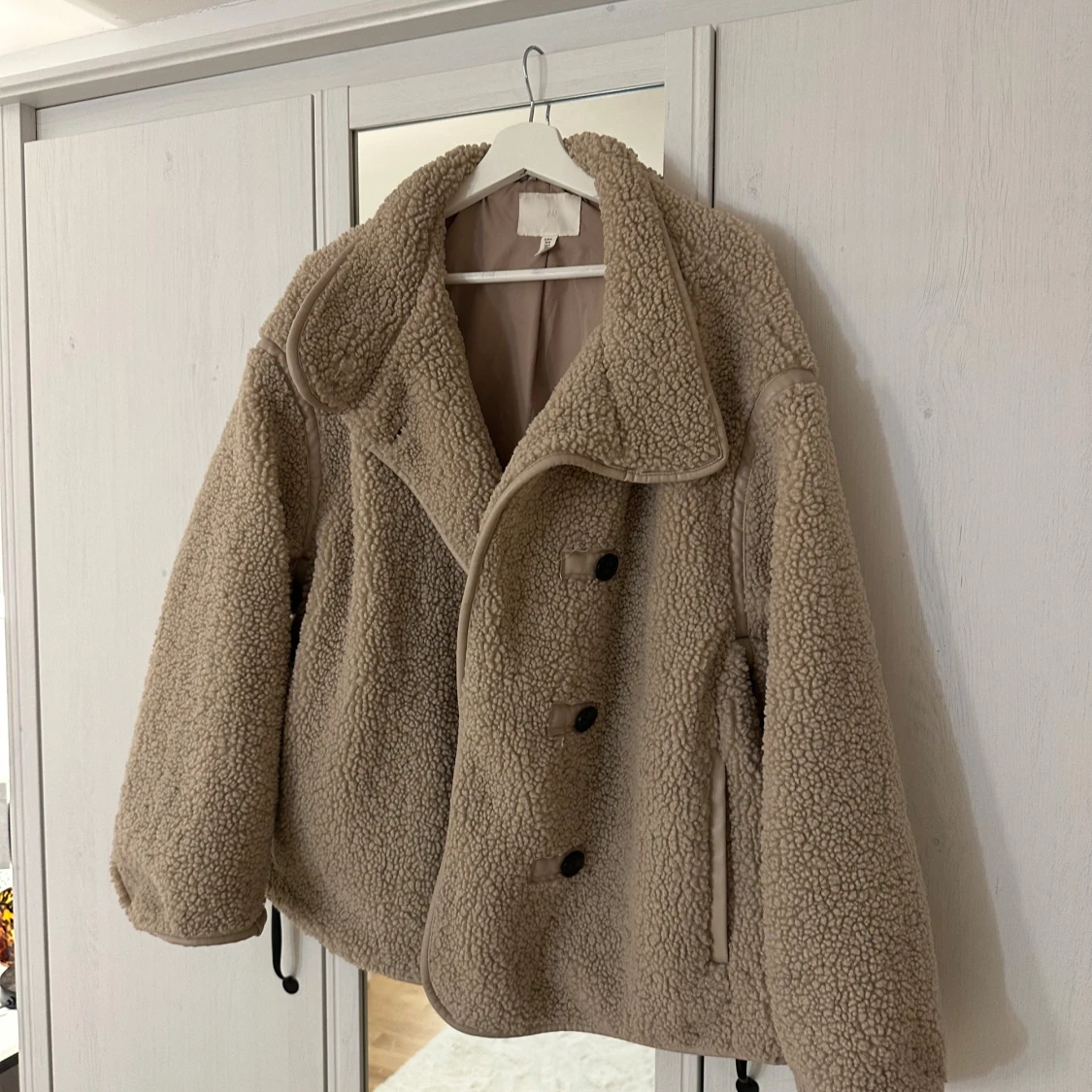 Beige teddykappa - 1