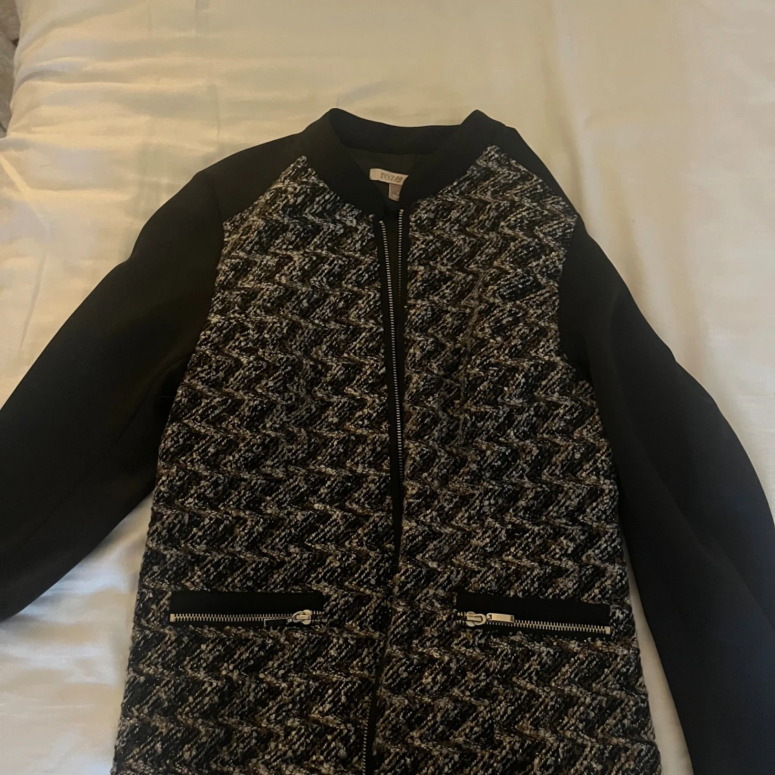 Svart och grå bomberjacka från Notex