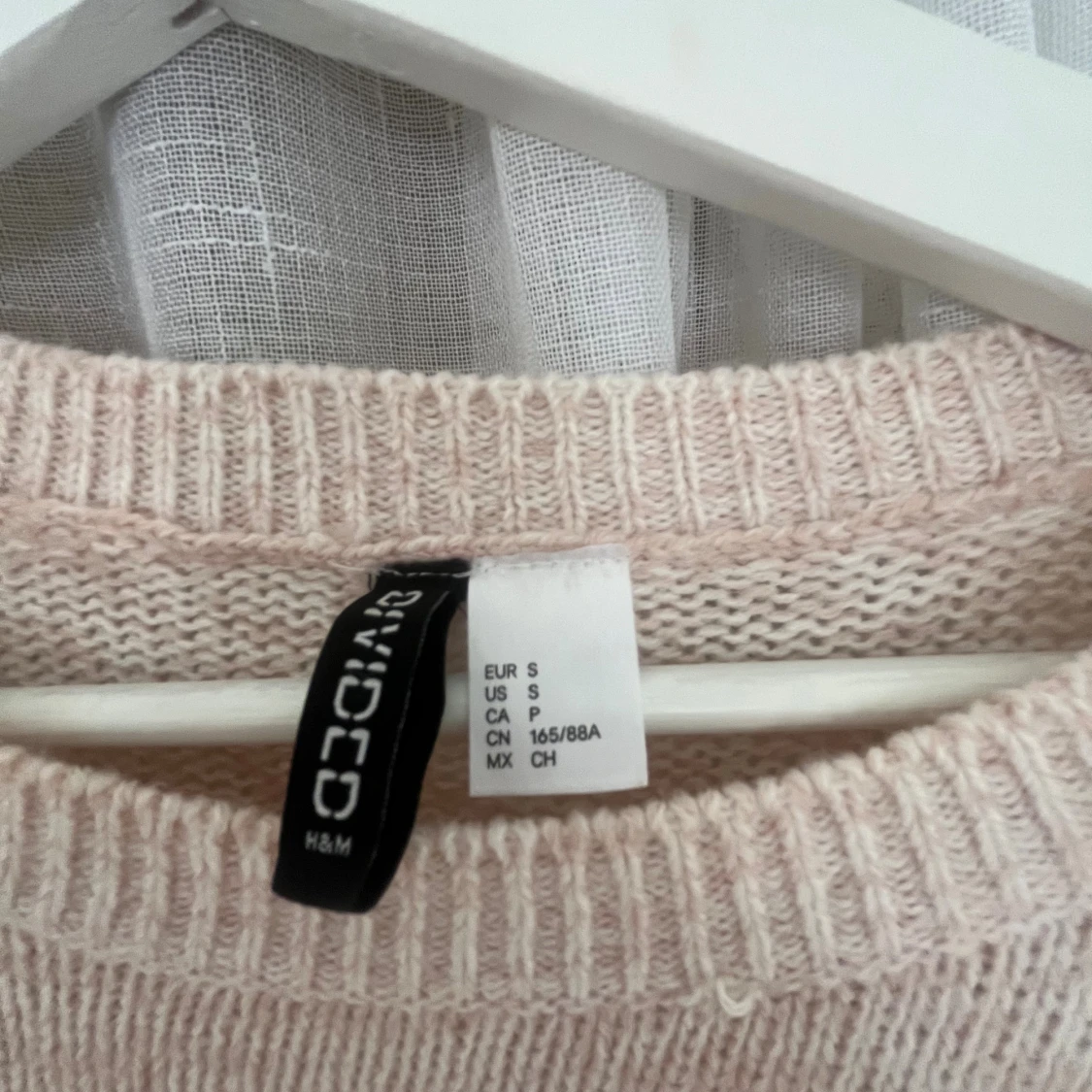 Ljusrosa stickad - 1