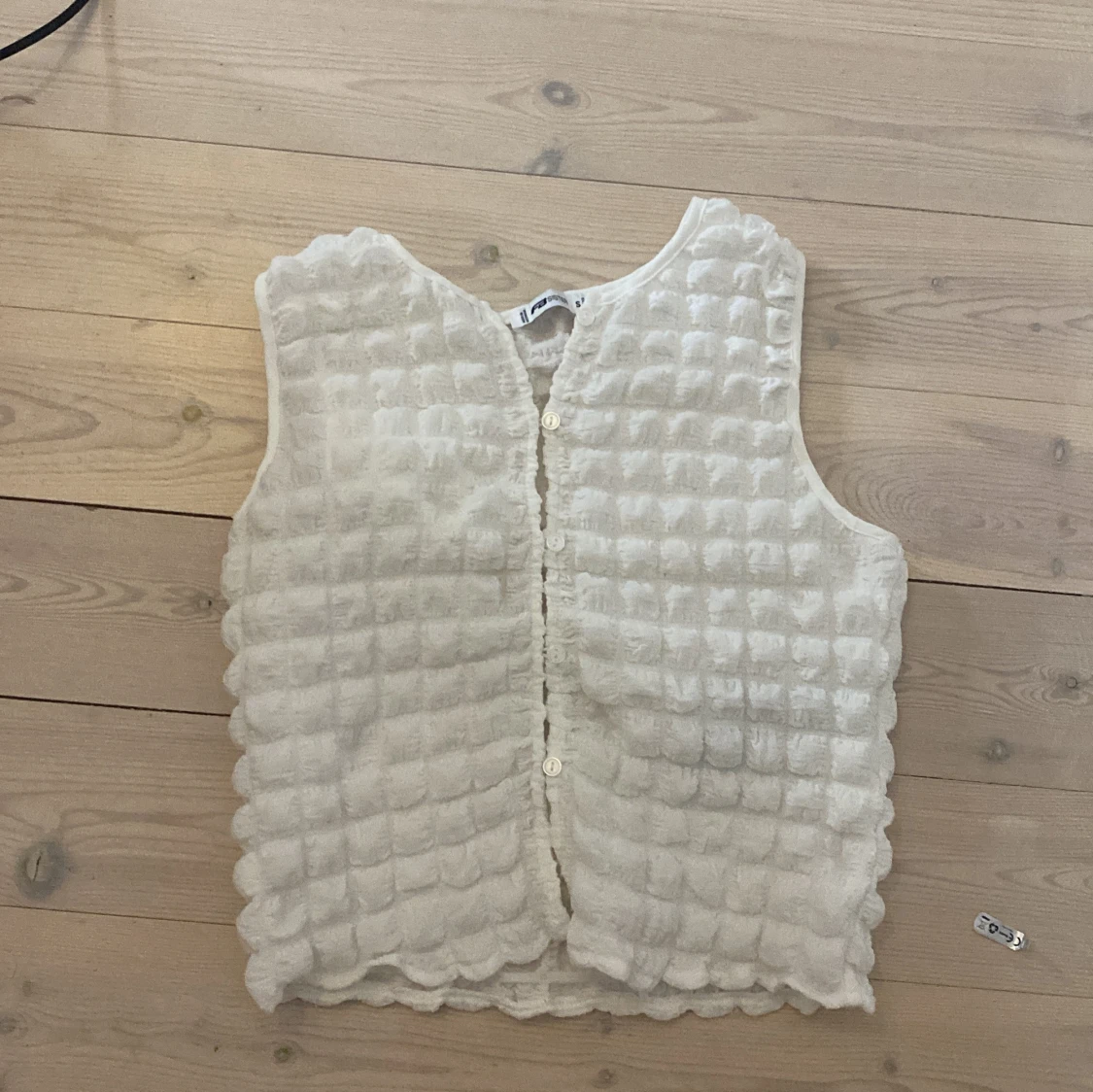 Vit quiltad väst från FB Sister