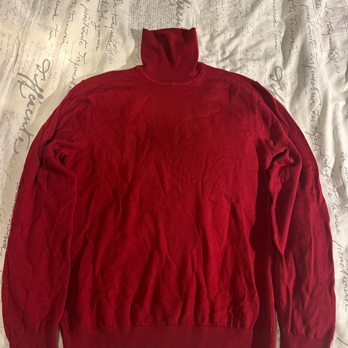 Röd polotröja i merinoull These Glory Days