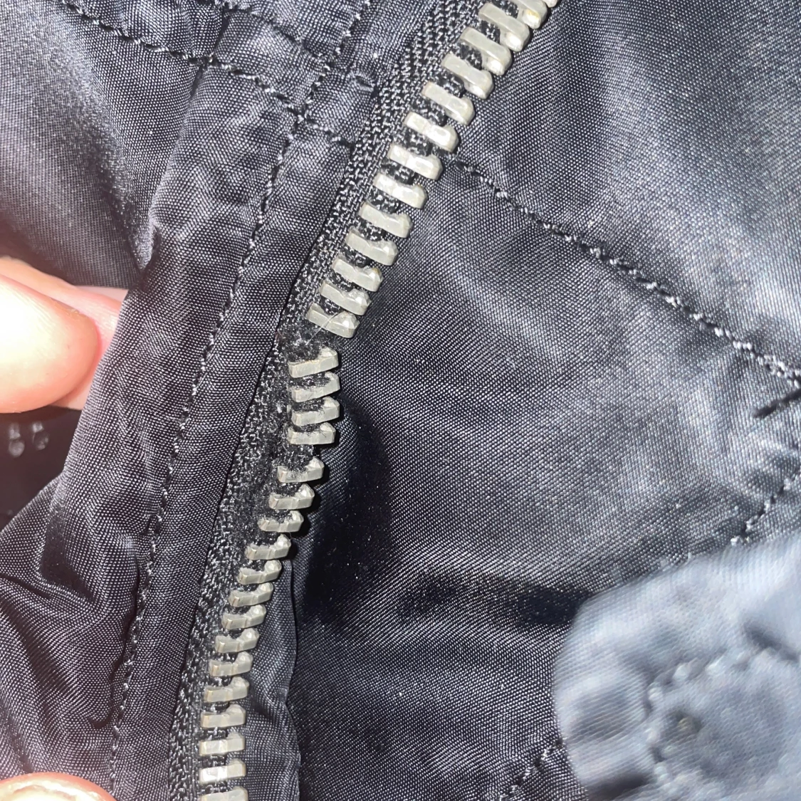 Svart parkas från Alpha Industries - 2