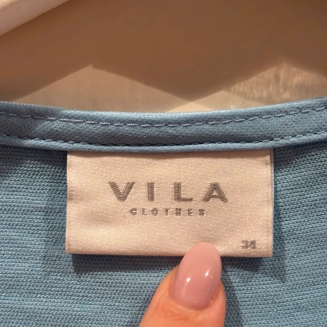 Ljusblå omlottopp från Vila - 2