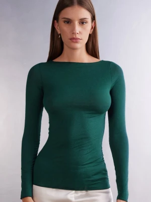 Mörkgrön långärmad topp intimissimi - Snygg mörkgrön långärmad topp med rundad hals och slim passform. Tunn och mjuk kvalitet som sitter skönt mot kroppen. Perfekt att styla med jeans eller kjol för en clean look. passar både S och XS och M