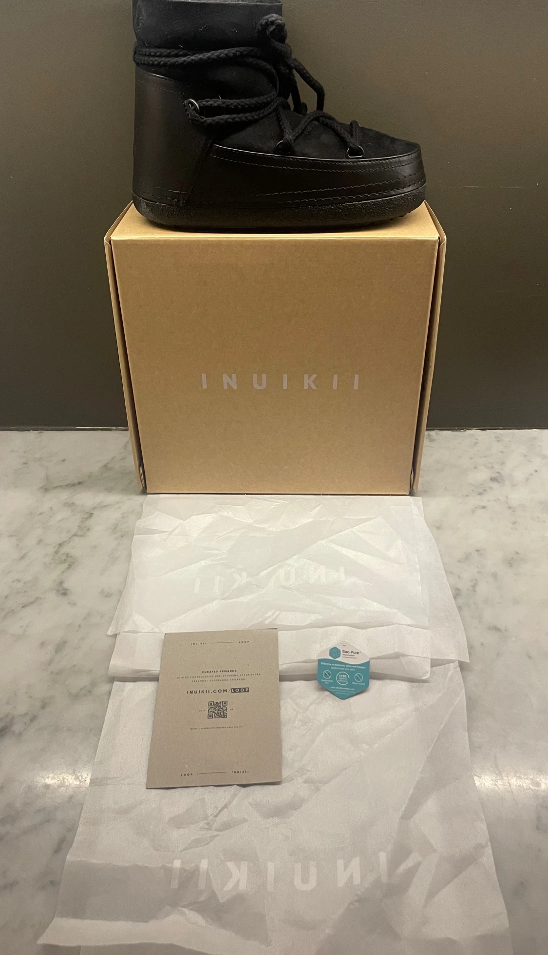 Svarta Inuikii skor - 4