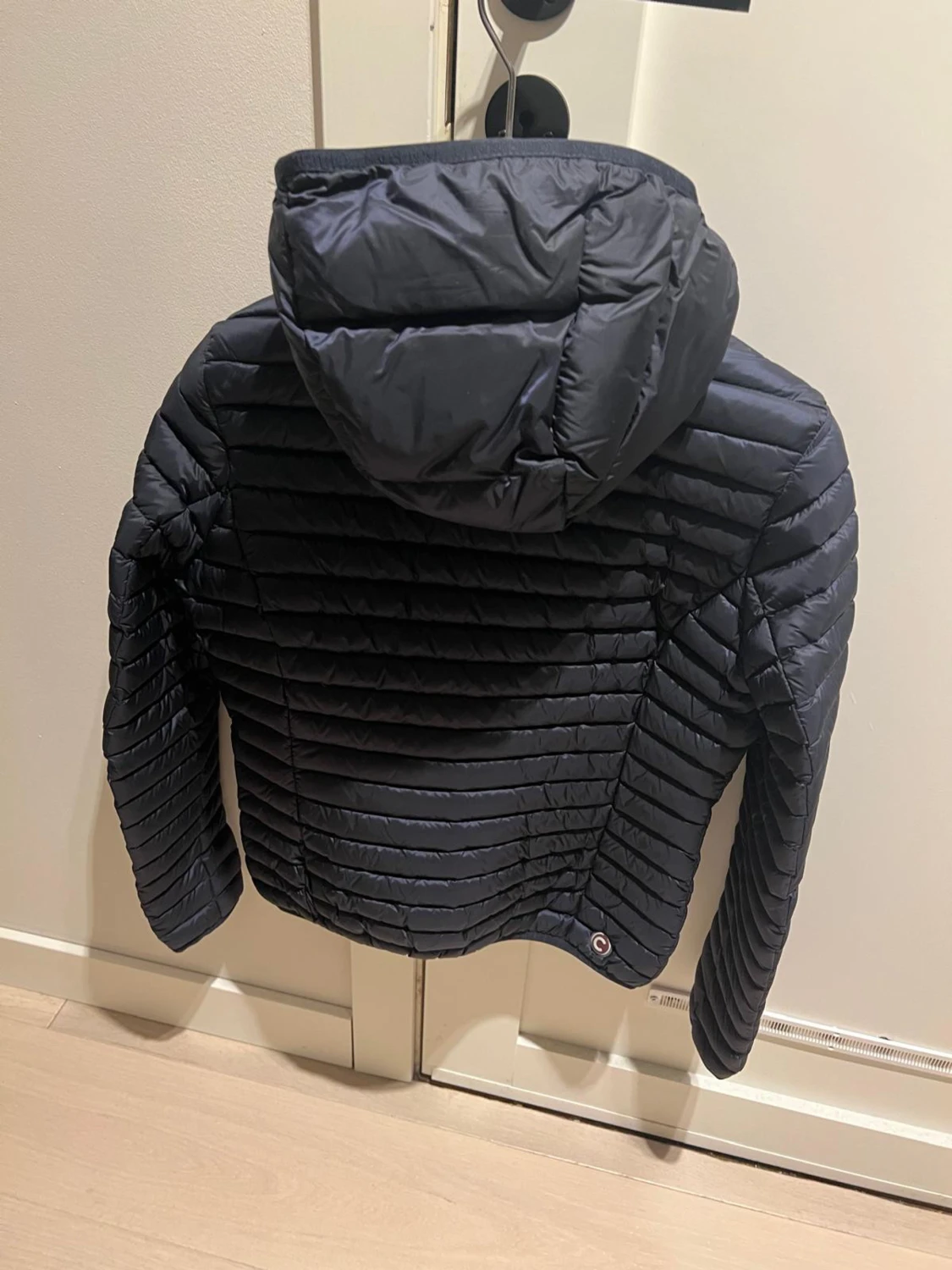 Mörkblå Colmar pufferjacka med huva - 1