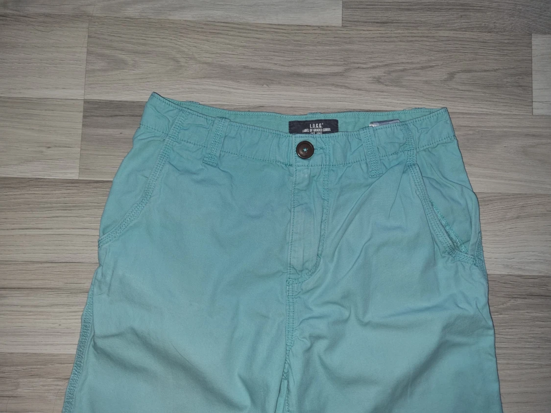 Turkosa shorts från H&M L.O.G.G. strl 164 - 4