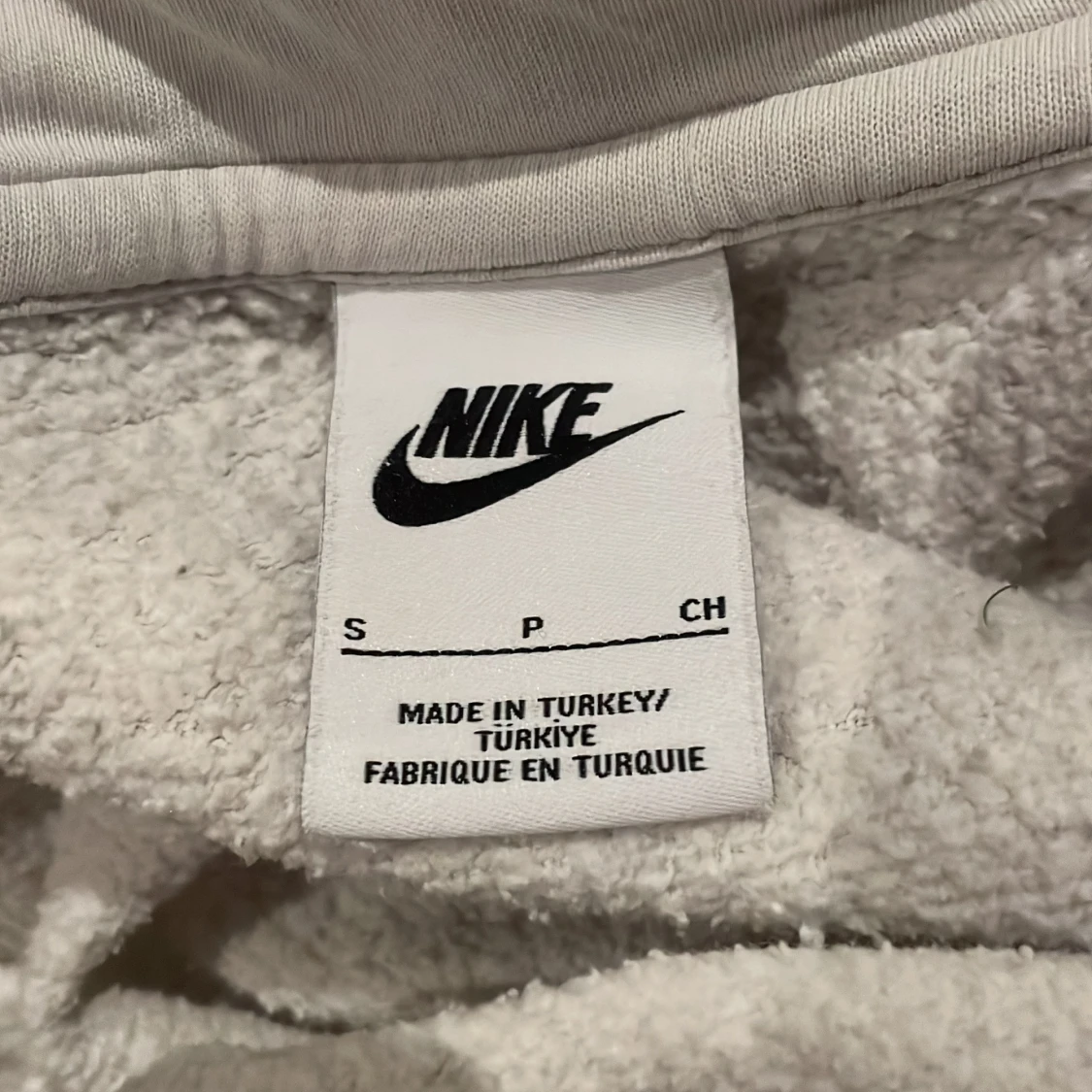 Vit hoodie från Nike med dragkedja - 1