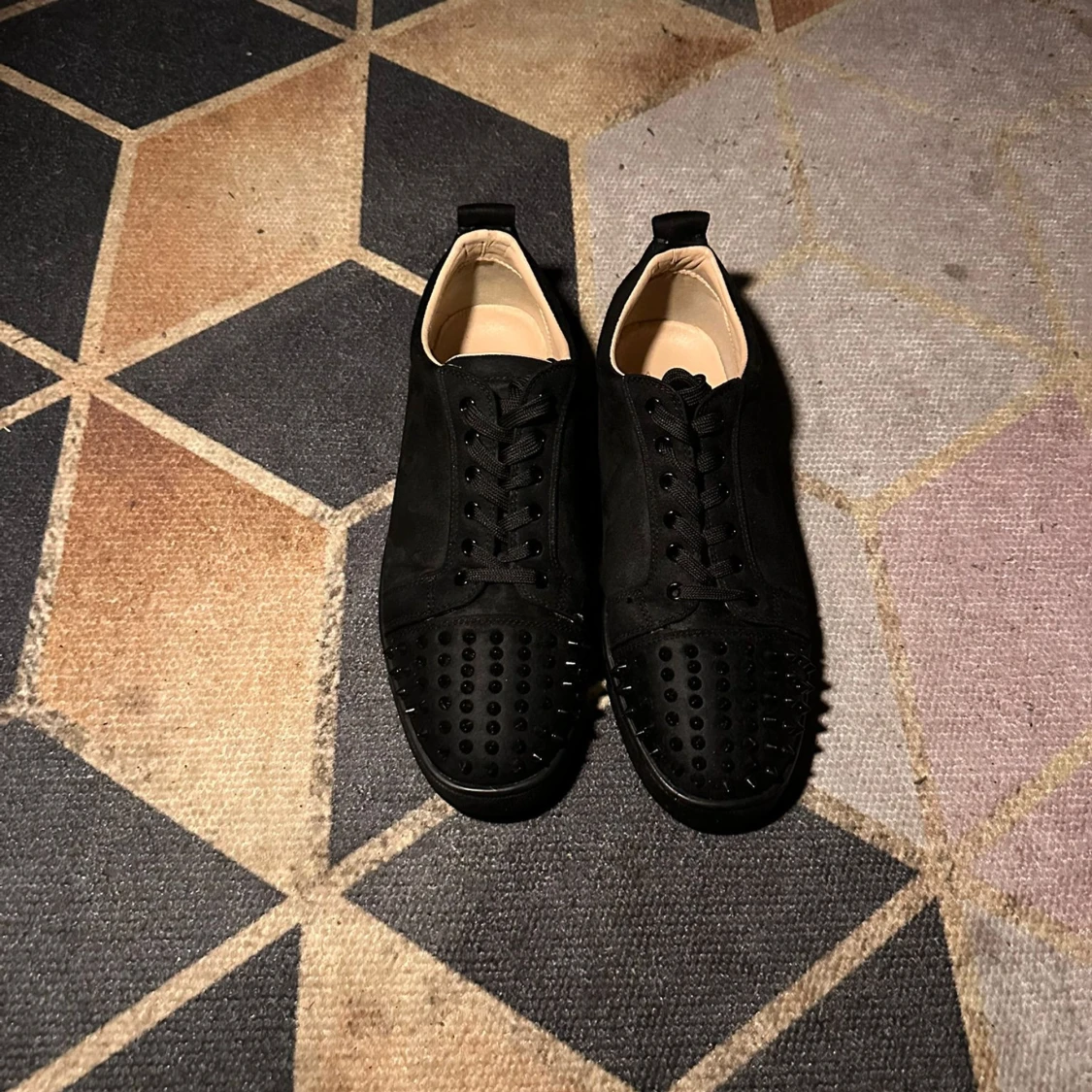 Svarta Louboutin sneakers