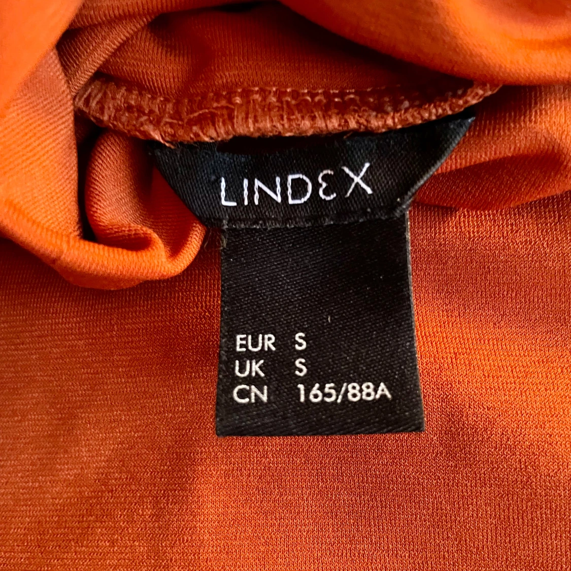 Orange polotröja från Lindex - 1