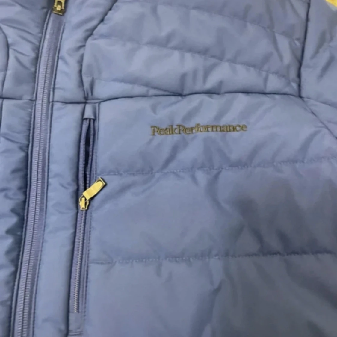 Blå pufferjacka Peak Performance - 4