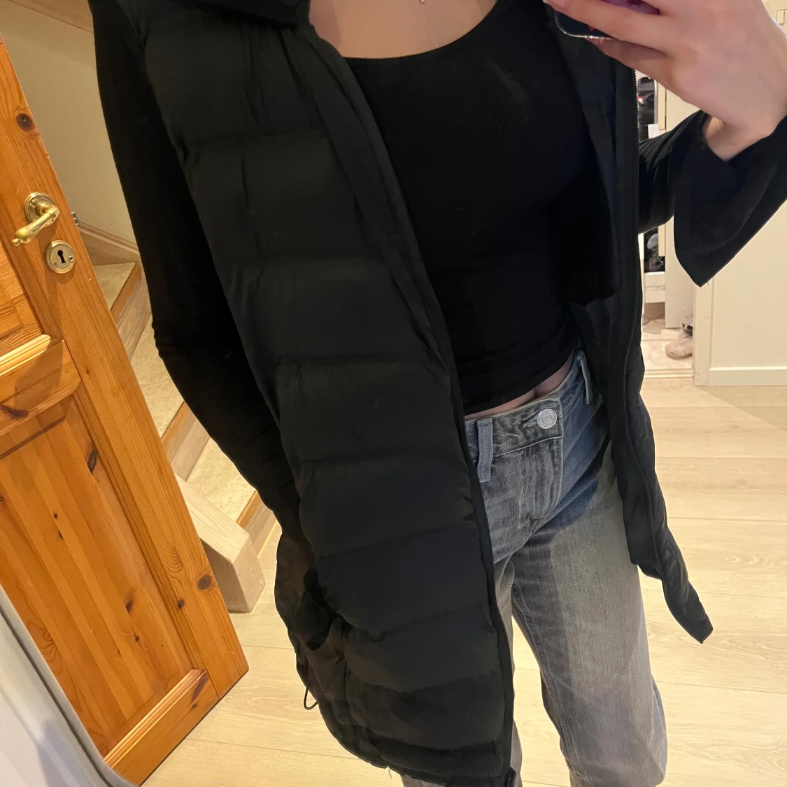 Svart lång dunväst från Zara