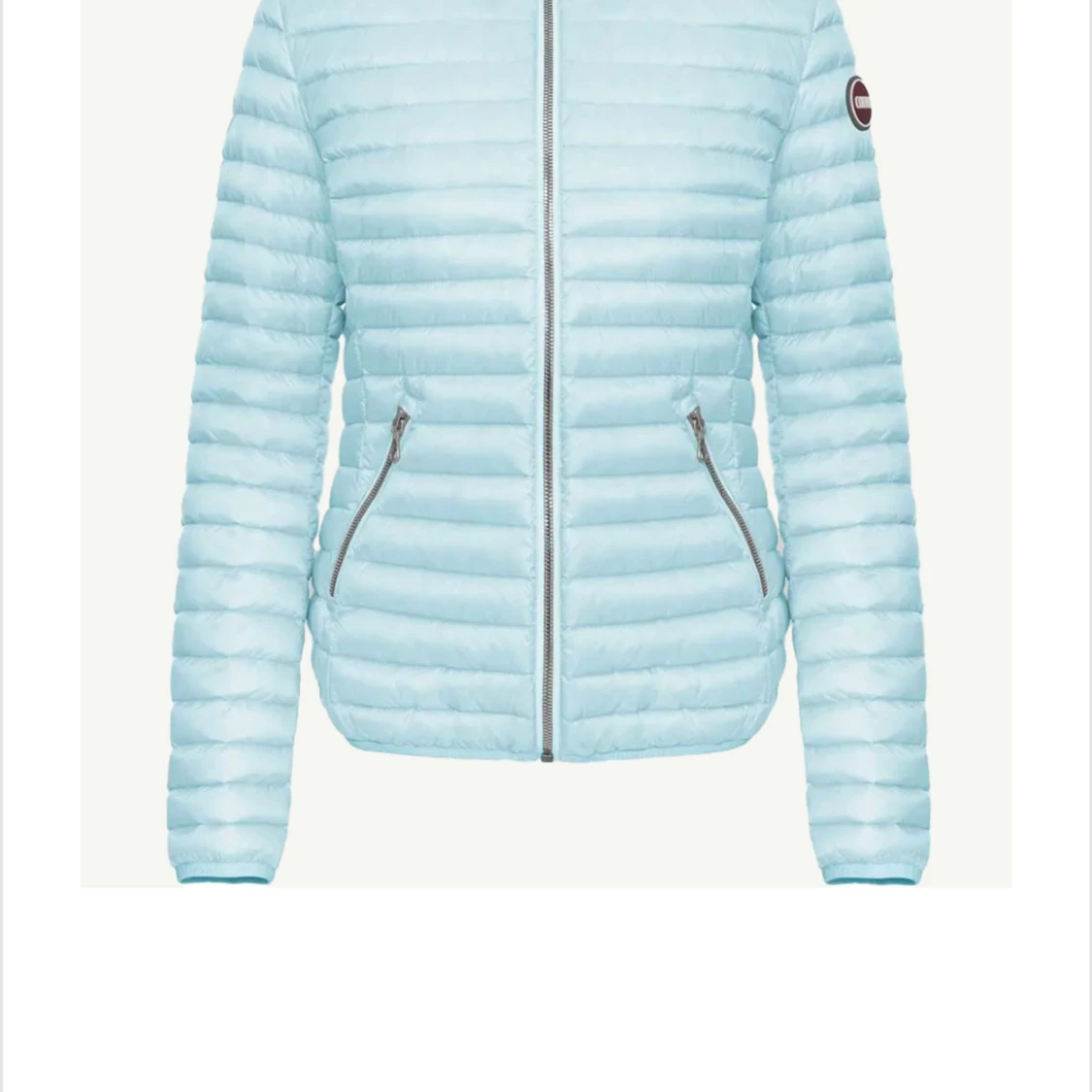 Ljusblå dunjacka från Colmar