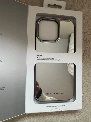 Mobilskal - Oanvänt mobilskal från ideal of sweden med spegel, passar iphone 15 pro max 💖💖 