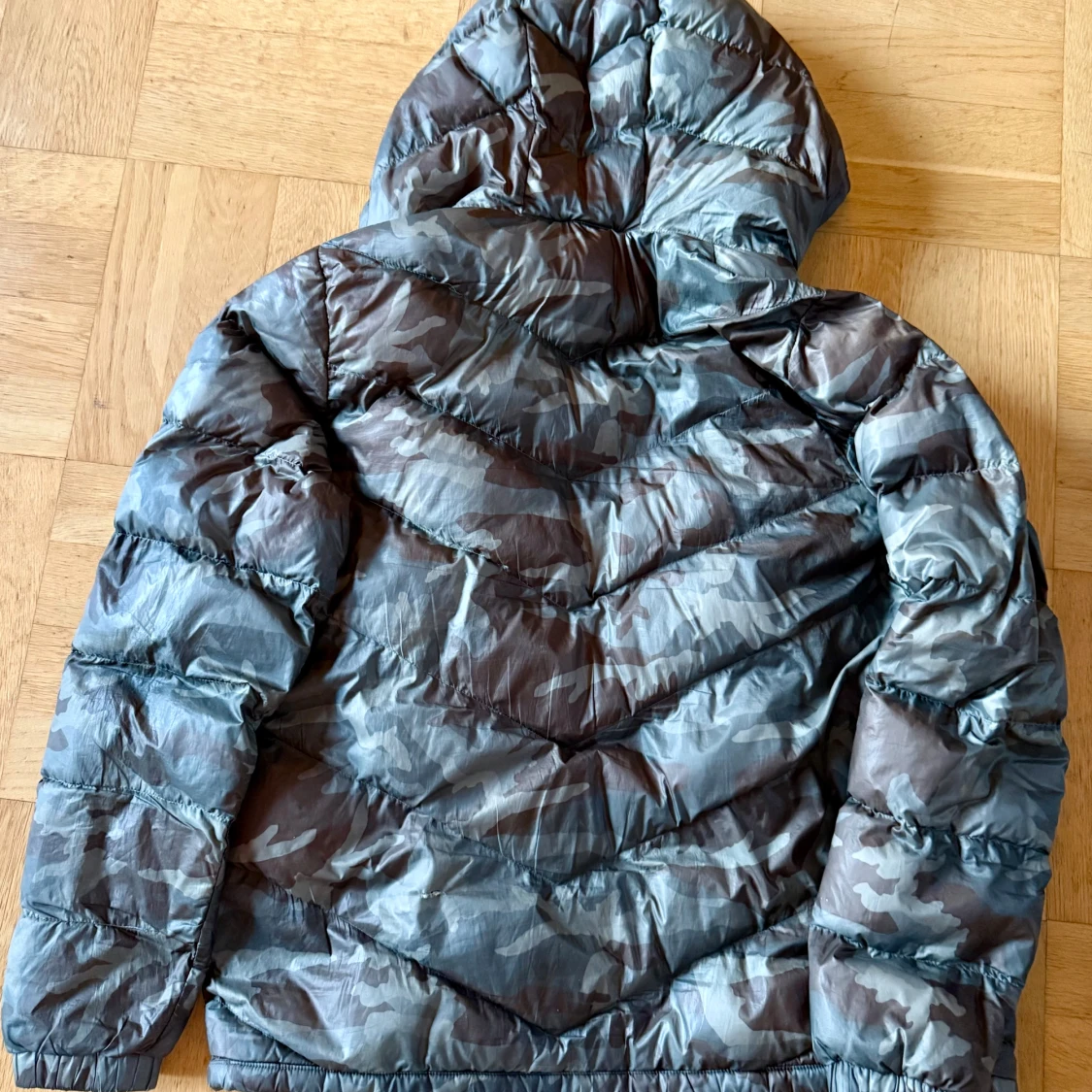 Camouflage pufferjacka från Woolrich - 1