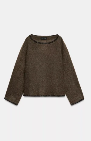 Stickad tröja med kontraster från Zara - Jättesnygg tröja från Zara med svarta kontraster. Kliar eller sticks inte!🤎