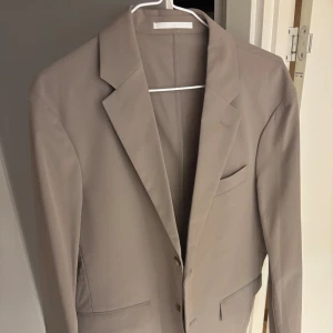 Kavaj ifrån Uniqlo - Uniqlo Kavaj | helt oanvänd skick 10/10 | Size XS passar S.