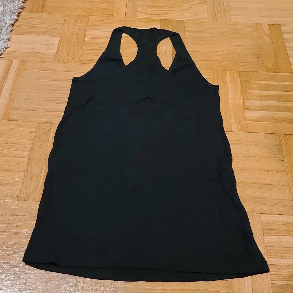 Svart linnetopp från Nike med tryck - 2