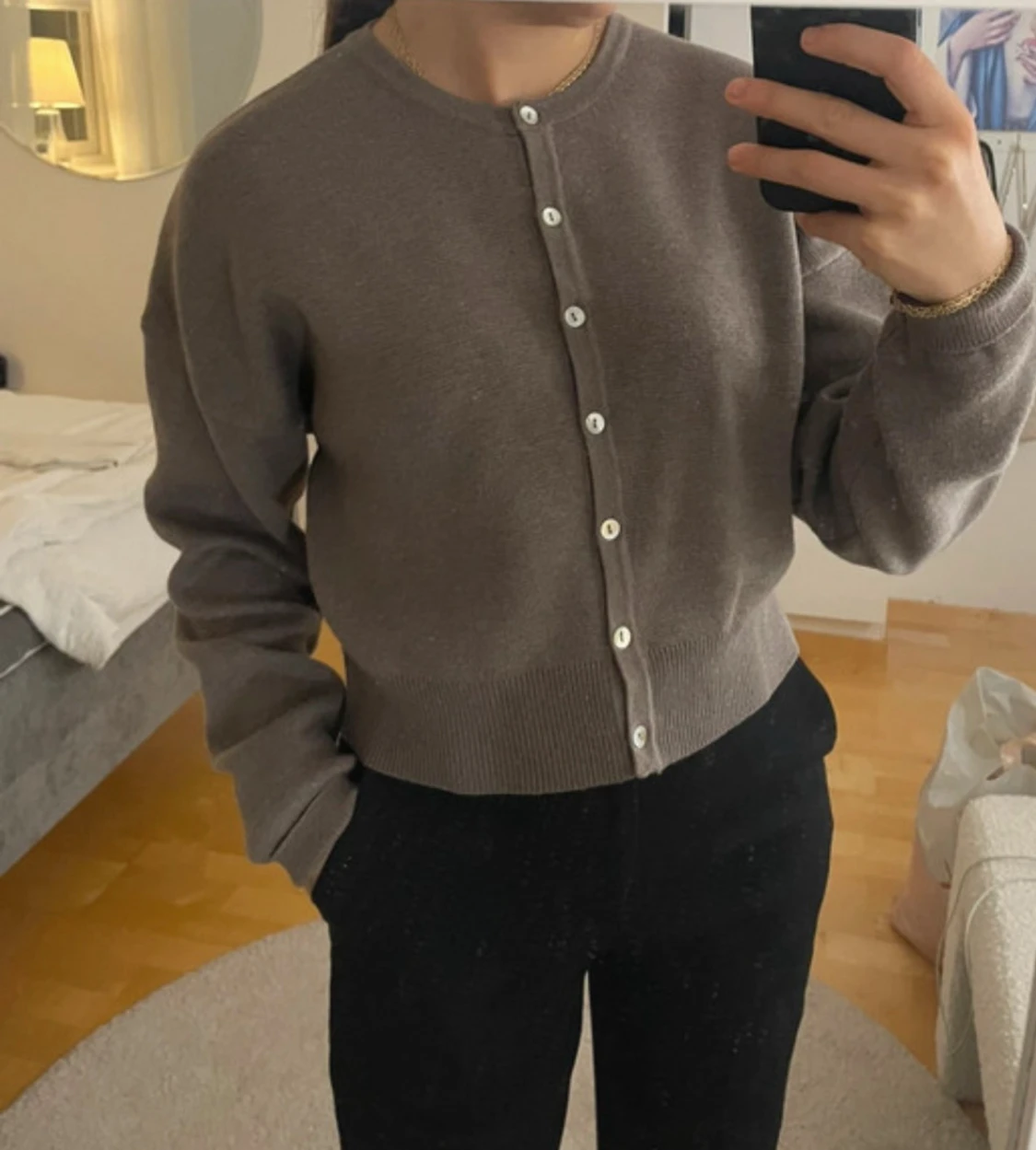 Brun kofta med knappar - 1