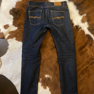 Nudie jeans  - Säljer ett par snygga nudie jeans I modellen lean dean vilket är slim fit. Dem är k bra skick, hör av er om ni har några funderingar 😀 