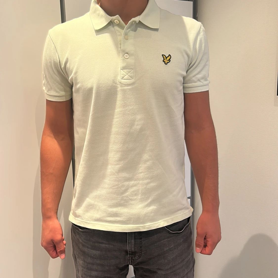 Ljusgrön pikétröja från Lyle & Scott