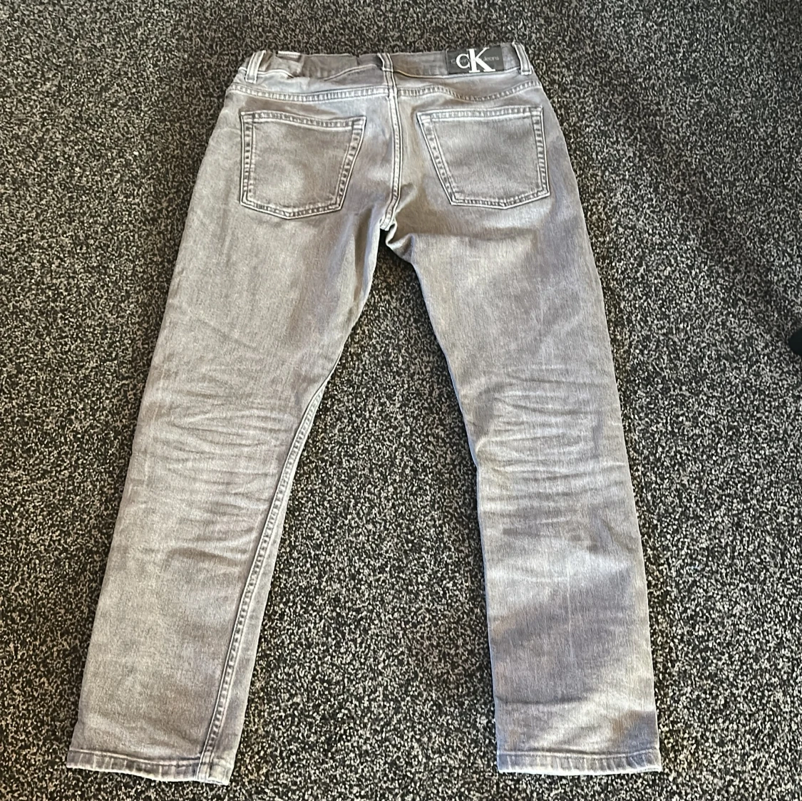 Grå jeans från Calvin Klein - 1