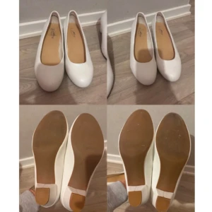 Ett par vita skor med låg klack 39  - Strl 39 