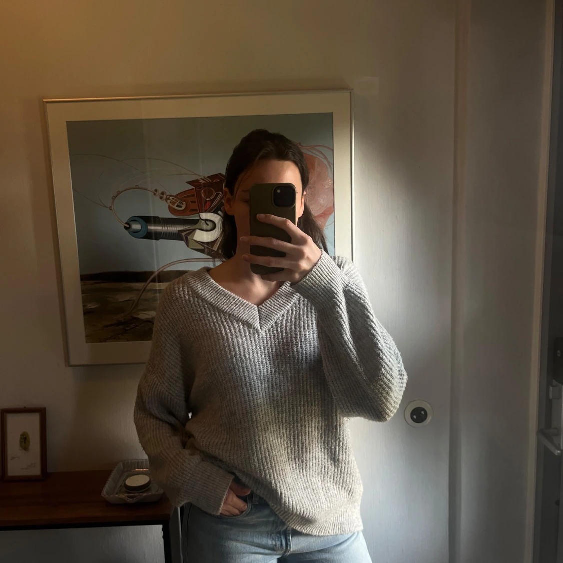 Grå stickad tröja från Ginatricot