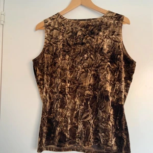 Kappahl linne brun - Storlek L skulle jag säga. 