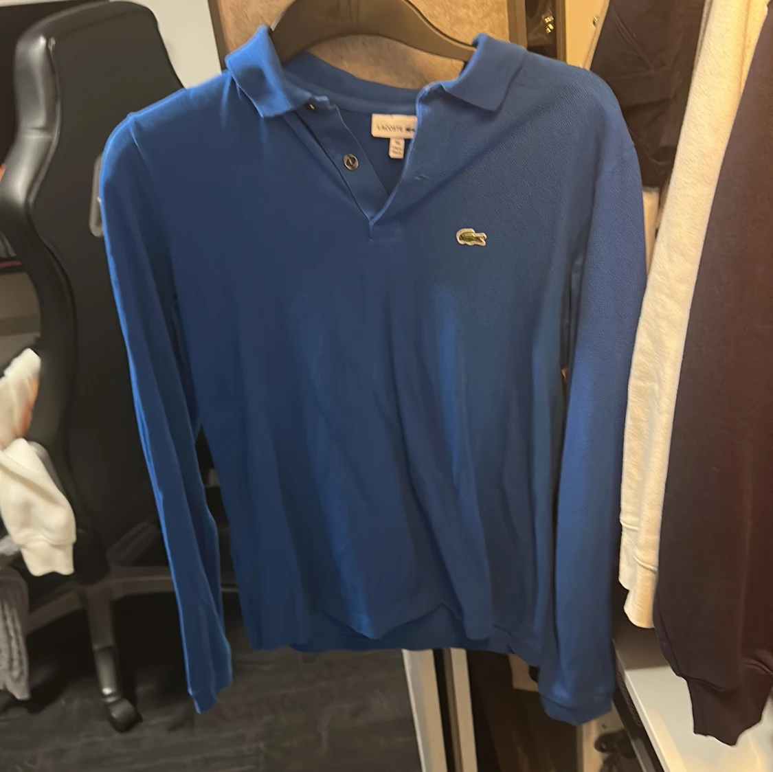 Blå långärmad pikétröja från Lacoste