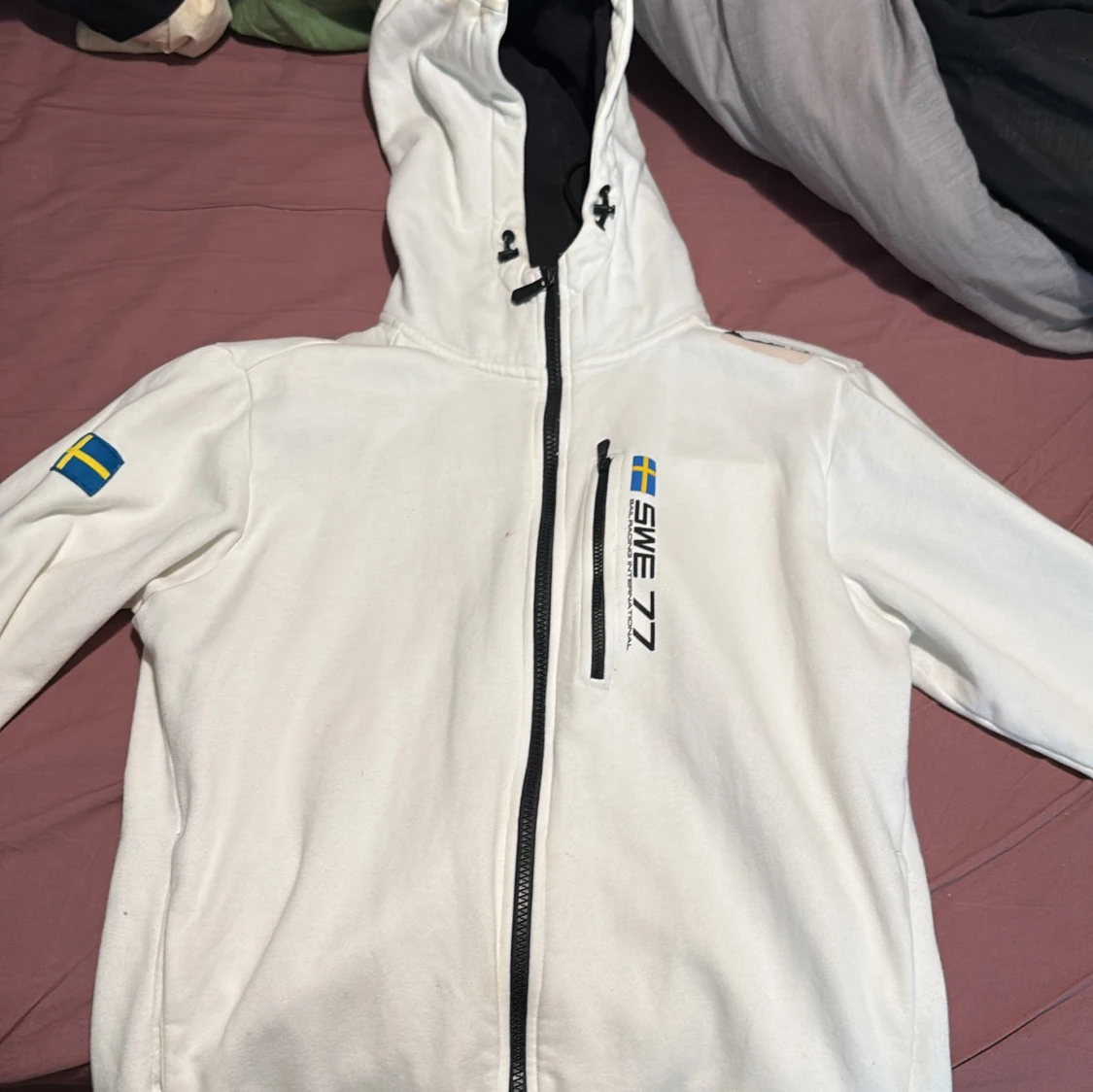 Vit hoodiejacka från Sail Racing International