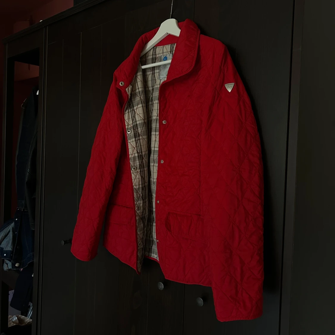 Röd quiltad underjacka i dun från Luhta