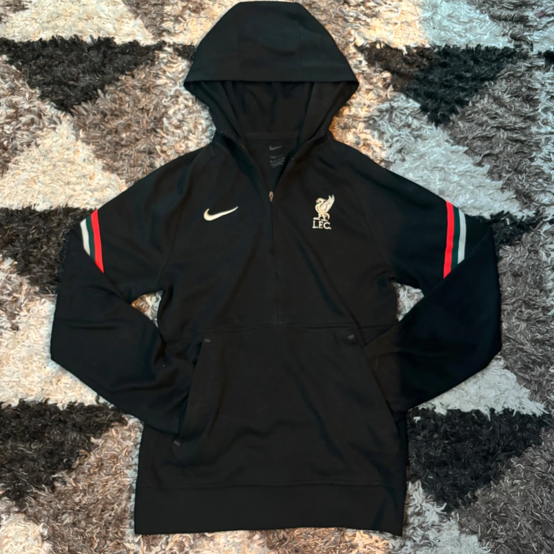 Svart hoodie från Nike med L.F.C. logga