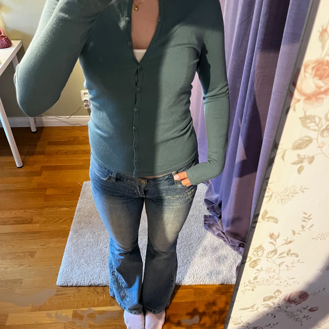 Blå kofta med knappar