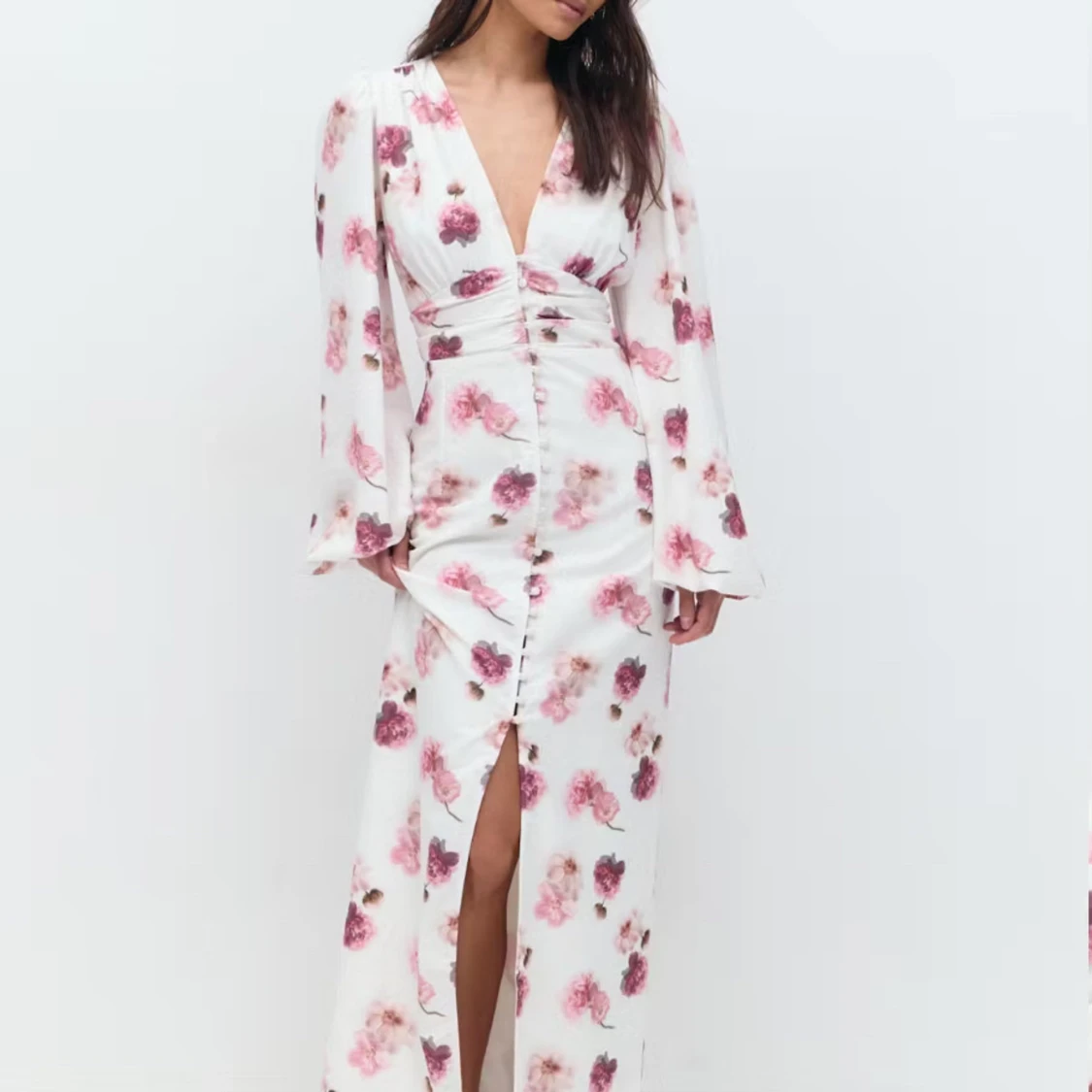 Vit blommig långklänning